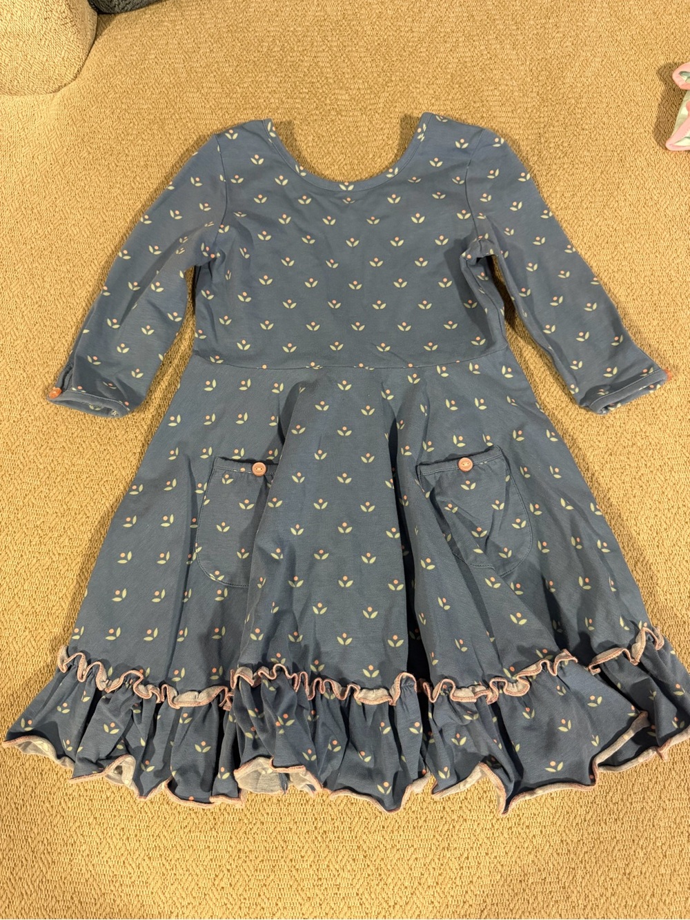 Shrimp and Grits
Girls Dusty Blue Floral Ruffle Hem Dress with Pockets